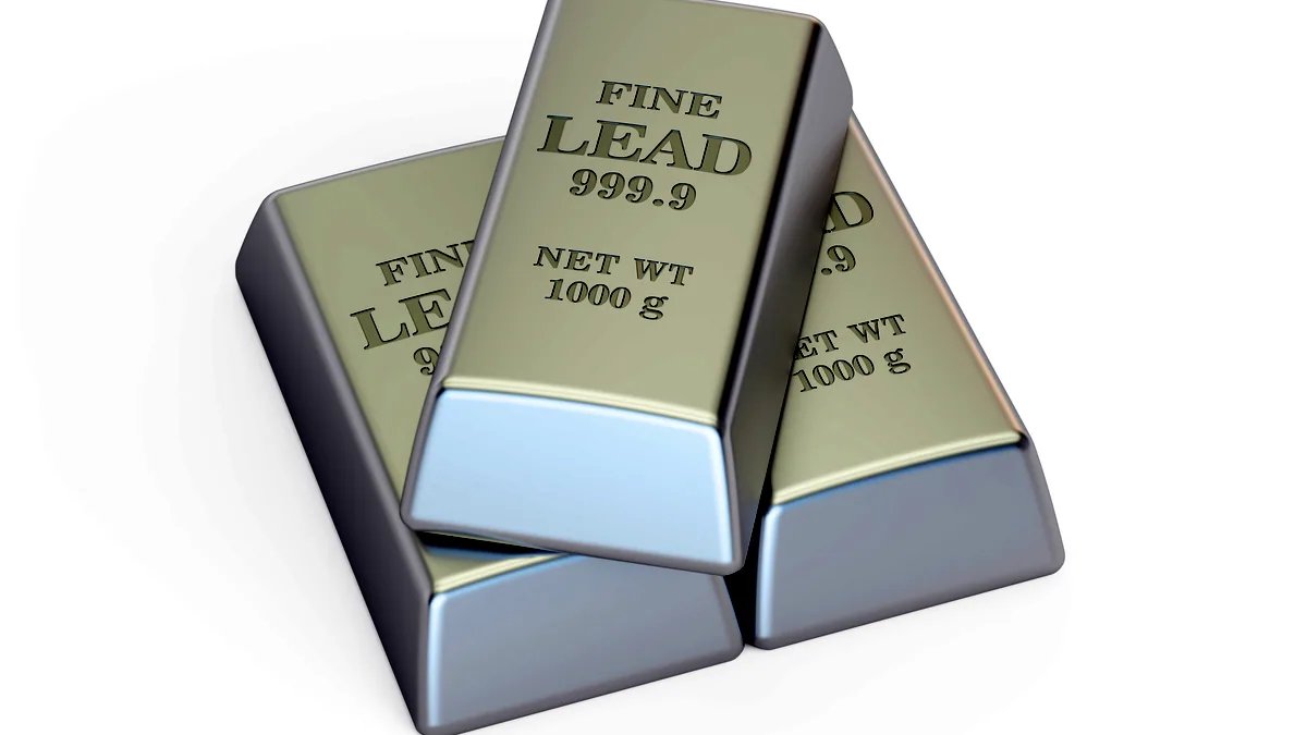 Two brushed silver bars laid side by side on a dark surface, one slightly brighter than the other.